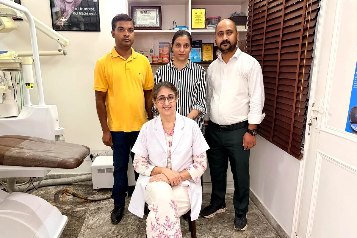 Dr. Mona Prabhakar seated with the team at The Orthodontic Clinic, Sector 31 Gurugram